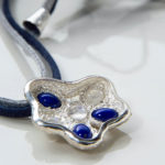 Corolla necklace,close up side view,lapis lazuli,moonstone
