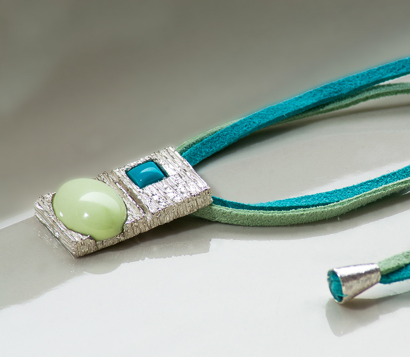Rectangular alcantara necklace,overall view,crisolemon, turquoise